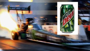 Jul 10, 2015; Joliet, IL, USA; Fire comes from the engine on the dragster of NHRA top fuel driver Brittany Force as she does a burnout during qualifying for the Route 66 Nationals at Route 66 Raceway. Mandatory Credit: Mark J. Rebilas-USA TODAY Sports